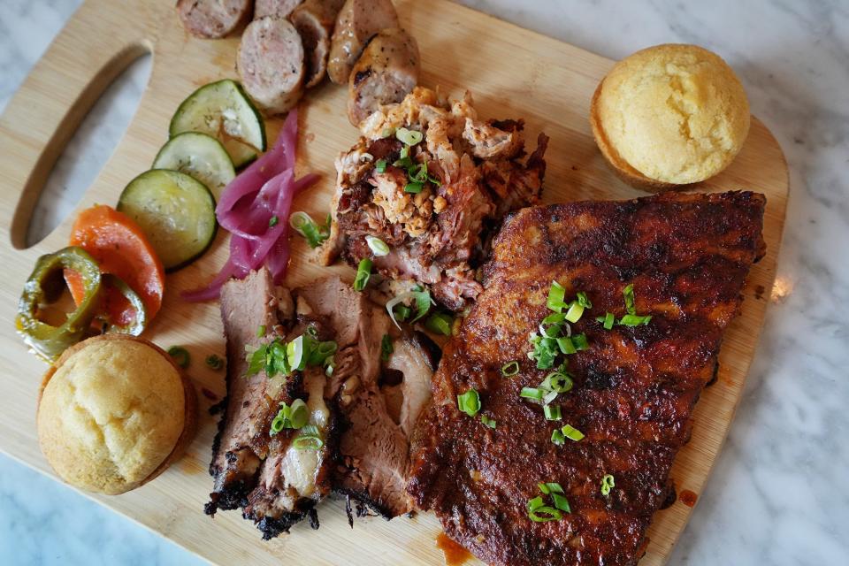 Sausage, house-pickled vegetables, housemade buns and smoked meats at at Kool Daddy's Barbecue in the former La Herradura Mexican Restaurant & Bar location on Frantz Road.