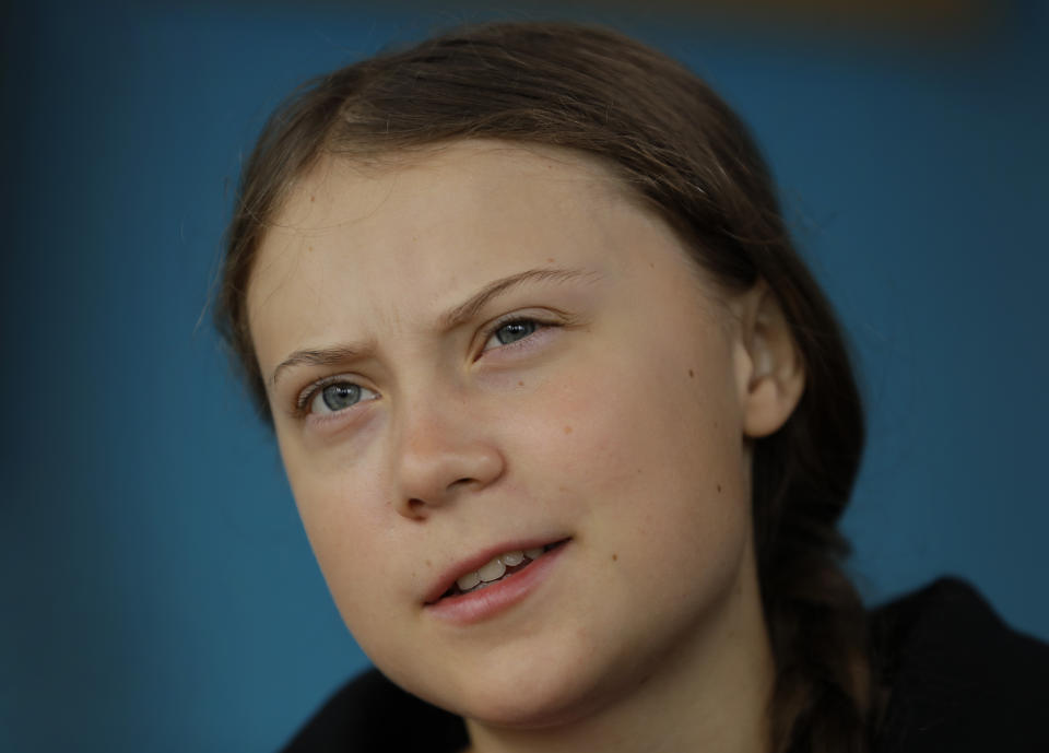 Greta Thunberg is interviewed by The Associated Press in Plymouth, England Tuesday, Aug. 13, 2019. Greta Thunberg, the 16-year-old climate change activist who has inspired student protests around the world, is heading to the United States this week - in a sailboat. (AP Photo/Kirsty Wigglesworth)