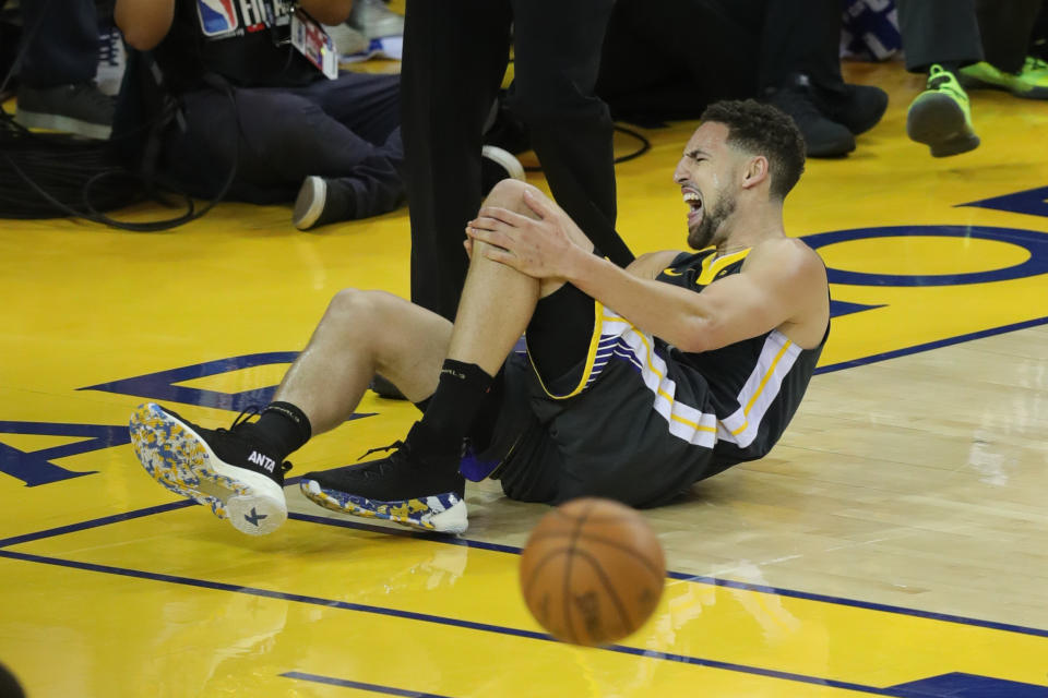 Jun 13, 2019; Oakland, CA, USA; Golden State Warriors guard Klay Thompson (11) reacts after being fouled by Toronto Raptors guard Danny Green (14) during the second half in game six of the 2019 NBA Finals at Oracle Arena. Mandatory Credit:Sergio Estrada-USA TODAY Sports