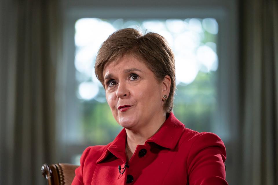 Scotland's First Minister of Scotland, Nicola Sturgeon, is interviewed, Tuesday, May 17, 2022, in Washington. Scotland’s leader said Tuesday, Jan. 17, 2023, that she will take the British government to court over its decision to block a Scottish law that makes it easier for people to change their gender on official documents.