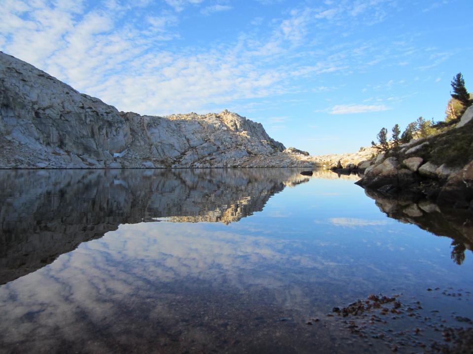 This Sept. 20, 2012 photo shows an unnamed lake in Yosemite National Park’s backcountry. Getting off the park’s extensive trail system means hikers can see pristine areas like this where fewer people pass through. (AP Photo/John Pain)