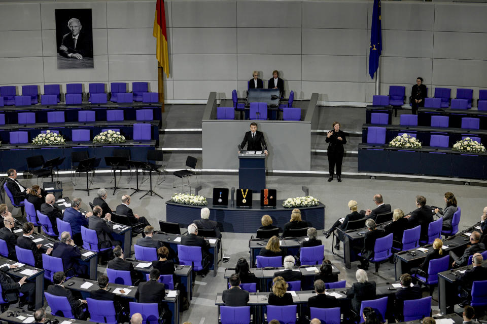 French President Emmanuel Macron delivers a speech during a state ceremony to commemorate late former German finance minister Wolfgang Schaeuble in the German parliament in Berlin, Germany, Monday, Nov.22, 2024. (AP Photo/Markus Schreiber)