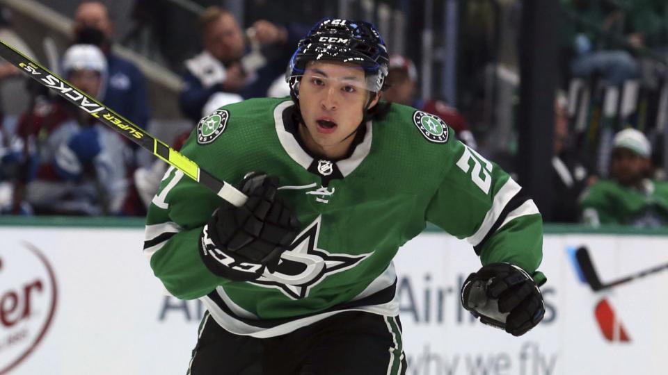 Dallas Stars left wing Jason Robertson skates down the ice at an NHL preseason hockey game against the Colorado Avalanche