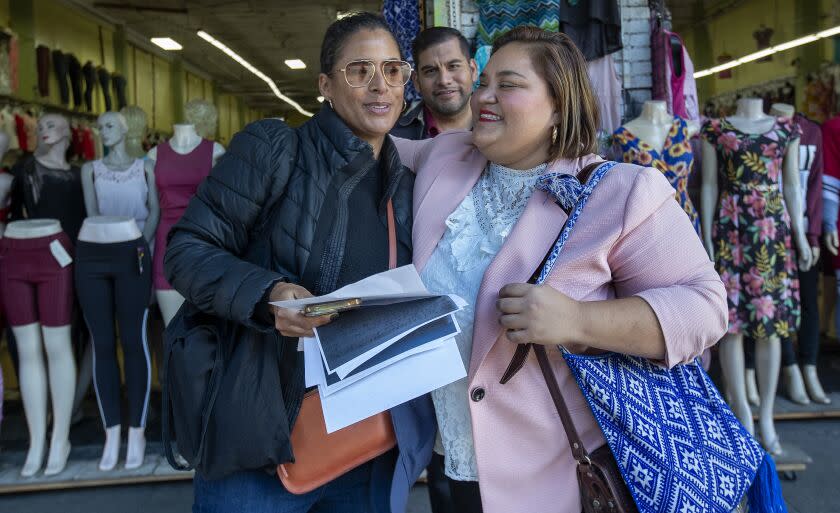 LOS ANGELES, CA-DECEMBER 9, 2022: UCLA professor Kelly Lytle Hernandez, left, is photographed with newly elected Los Angeles city council members Hugo Soto-Martinez and Eunisses Hernandez, during a tour Hernandez gave in downtown Los Angeles, tracing the steps of Ricardo Flores Magon, the Mexican anarchist who organized from Los Angeles in the early 1900's and helped to spark the Mexican Revolution. (Mel Melcon / Los Angeles Times)