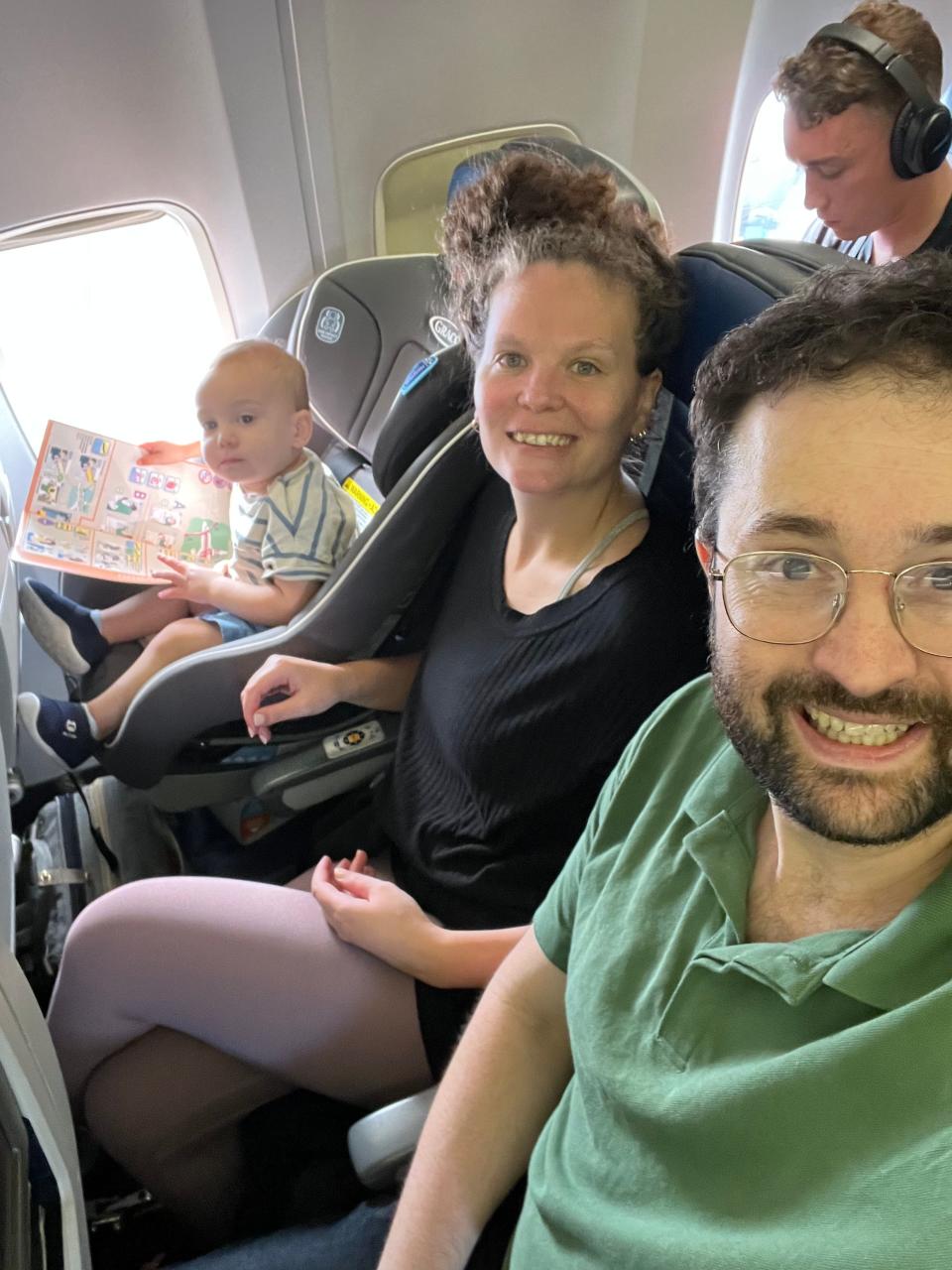 Boris Meyerovich and his wife, Noa Grinderfer, and son, Ori, on their flight back to the U.S. last week.