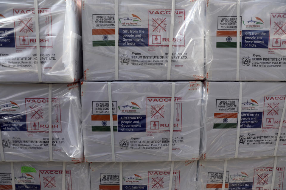 Boxes of the first shipment of 500,000 doses of the AstraZeneca coronavirus vaccine made by Serum Institute of India, donated by the Indian government, await distribution at the customs area of the Hamid Karzai International Airport, in Kabul, Afghanistan, Sunday, Feb. 7, 2021. (AP Photo/Rahmat Gul)