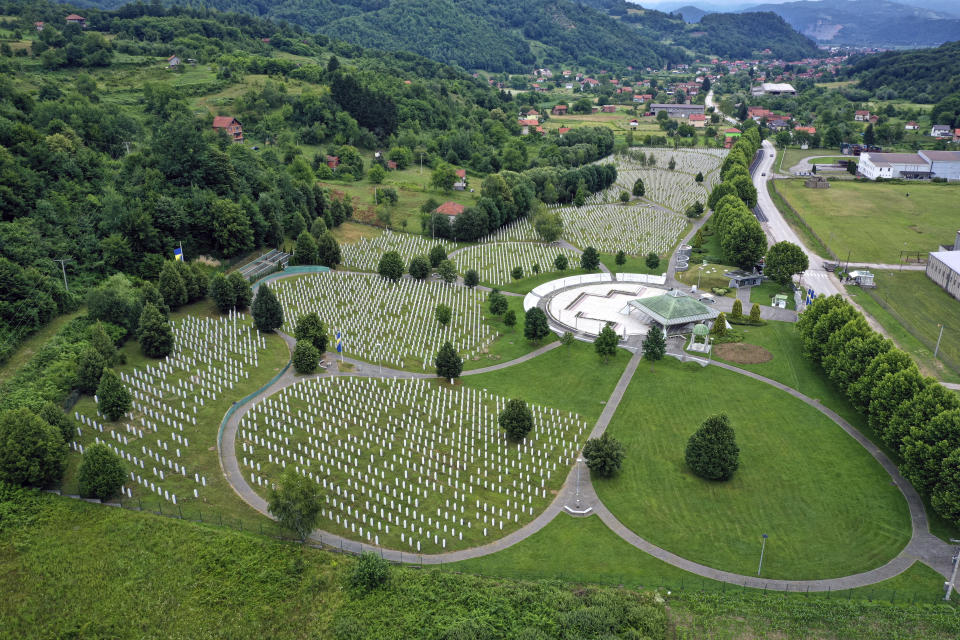 Gravestones are lined up at the memorial cemetery in Potocari, near Srebrenica, Bosnia, Tuesday, July 7, 2020. A quarter of a century after they were killed in Sreberenica, eight Bosnian men and boys will be laid to rest Saturday, July 11. Over 8,000 Bosnian Muslims perished in 10 days of slaughter after the town was overrun by Bosnian Serb forces in the closing months of the country’s 1992-95 fratricidal war. (AP Photo/Kemal Softic)