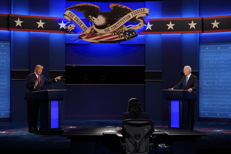 President Donald Trump points toward Democratic presidential candidate Joe Biden during the second and final presidential debate Thursday at Belmont University in Nashville. (Photo: ASSOCIATED PRESS)