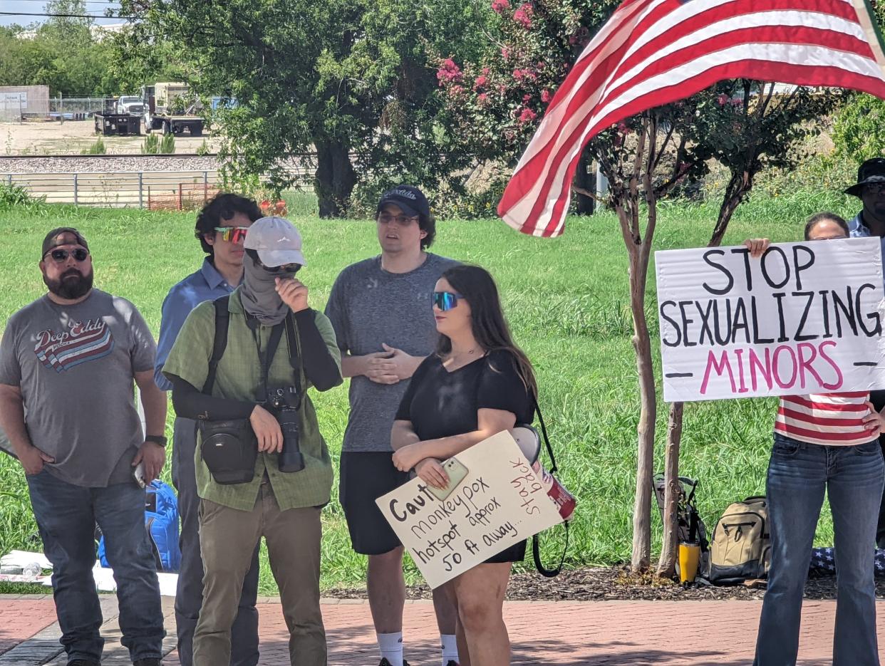 The protest against the drag show.