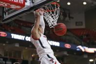 Texas Tech's Kevin McCullar (15) dunks the ball during the first half of an NCAA college basketball game against Eastern Washington on Wednesday, Dec. 22, 2021, in Lubbock, Texas. (AP Photo/Brad Tollefson)