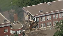 <p>Multiple people are reportedly trapped underneath a collapsed building that may have been caused by a blast at a Minneapolis school. (WCCO 4 News) </p>