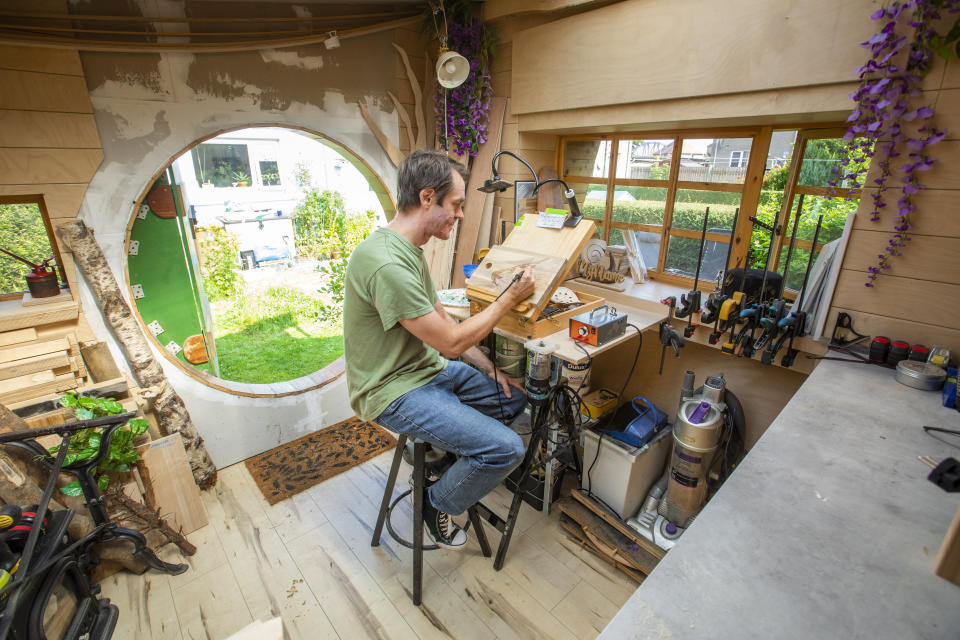 Ali Hughson has built a Lord of the Rings themed Hobbit House as a workshop in his back garden. (SWNS)
Hughson fulfilled his childhood dream by building a Hobbit house as a workshop. (SWNS)