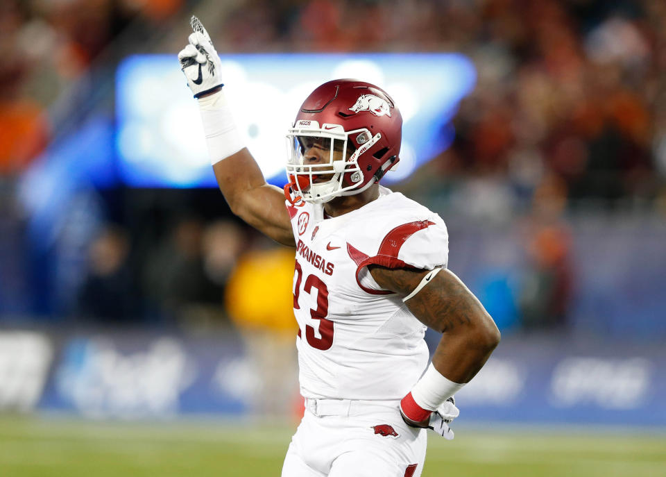 Dec 29, 2016; Charlotte, NC, USA; Arkansas Razorbacks linebacker Dre Greenlaw (23) celebrates after a fourth down stop in the first quarter against the <a class="link " href="https://sports.yahoo.com/ncaaf/teams/virginia-tech/" data-i13n="sec:content-canvas;subsec:anchor_text;elm:context_link" data-ylk="slk:Virginia Tech Hokies;sec:content-canvas;subsec:anchor_text;elm:context_link;itc:0">Virginia Tech Hokies</a> during the Belk Bowl at Bank of America Stadium. Mandatory Credit: Jeremy Brevard-USA TODAY Sports