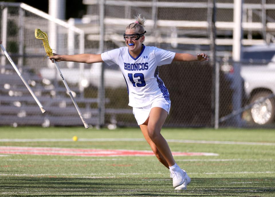 Bronxville's Kiki Tormey celebrates a late goal in a 15-8 win over Skaneateles to win the Class D state championship.