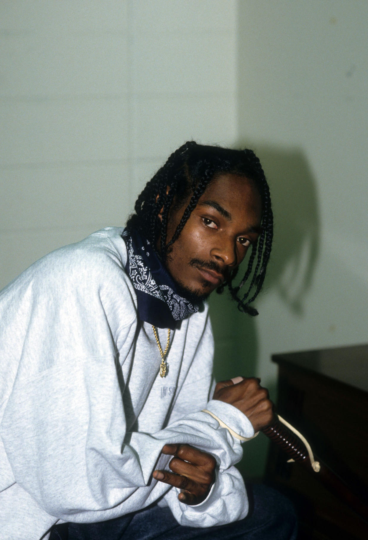  Snoop Dogg appears backstage when the Death Row Records label assembles at the 1995 Source Awards.  (Photo: Al Pereira/Getty Images/Michael Ochs Archives).