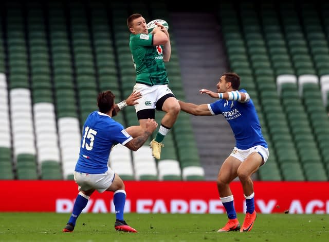 Andrew Conway, centre, claims a high ball