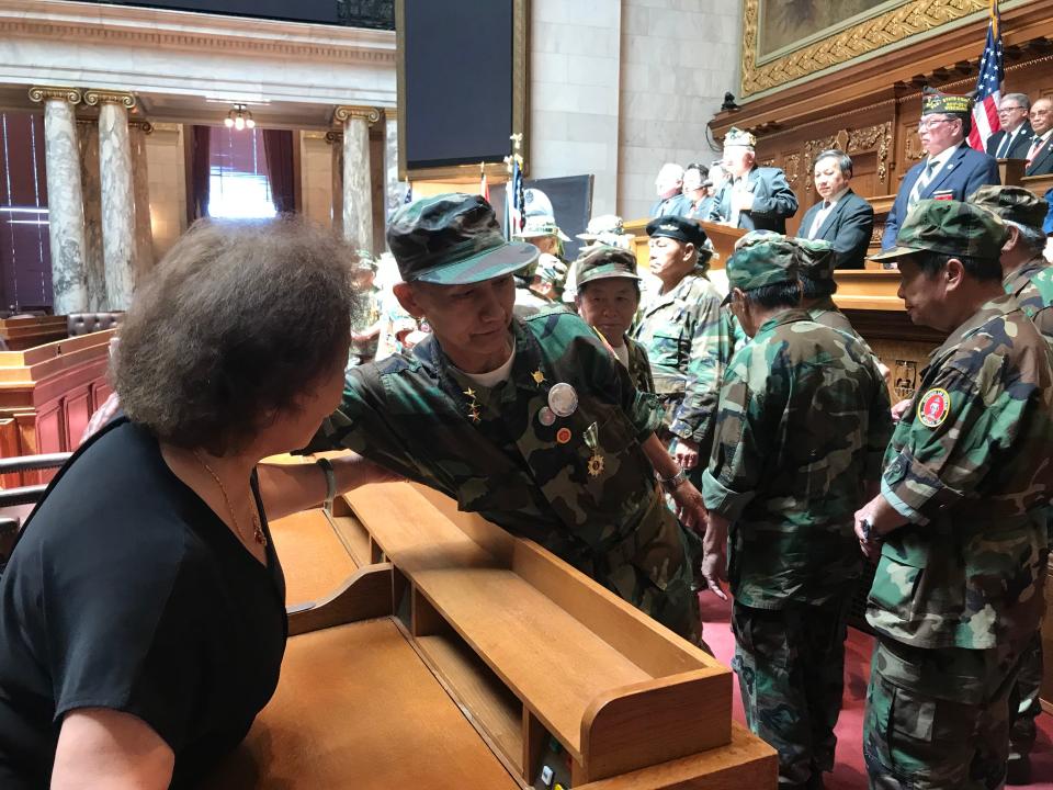 Hmong veterans, including Khue Vang, center, were recognized in the Assembly chambers of the state Capitol in Madison on Saturday, May 14, 2022 during Hmong-Lao Veterans Day. The day recognizes the military contributions made by Hmong veterans who served in the Secret War, a covert campaign during the Vietnam War in which the CIA recruited Hmong soldiers to fight Communist forces in Laos.