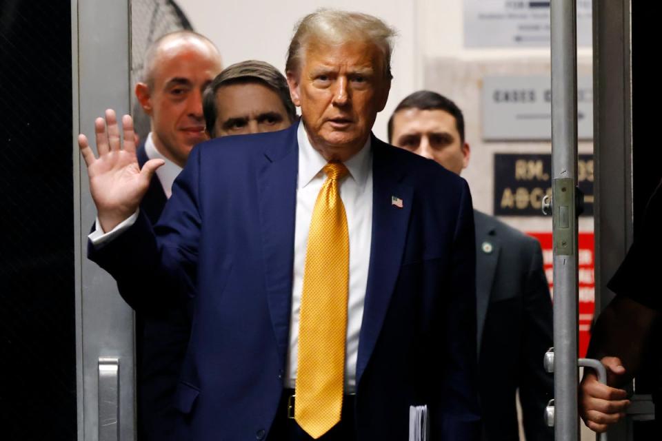 Former President Donald Trump returns to the courtroom after a lunch break during his trial at Manhattan criminal court before his trial in New York (AP)