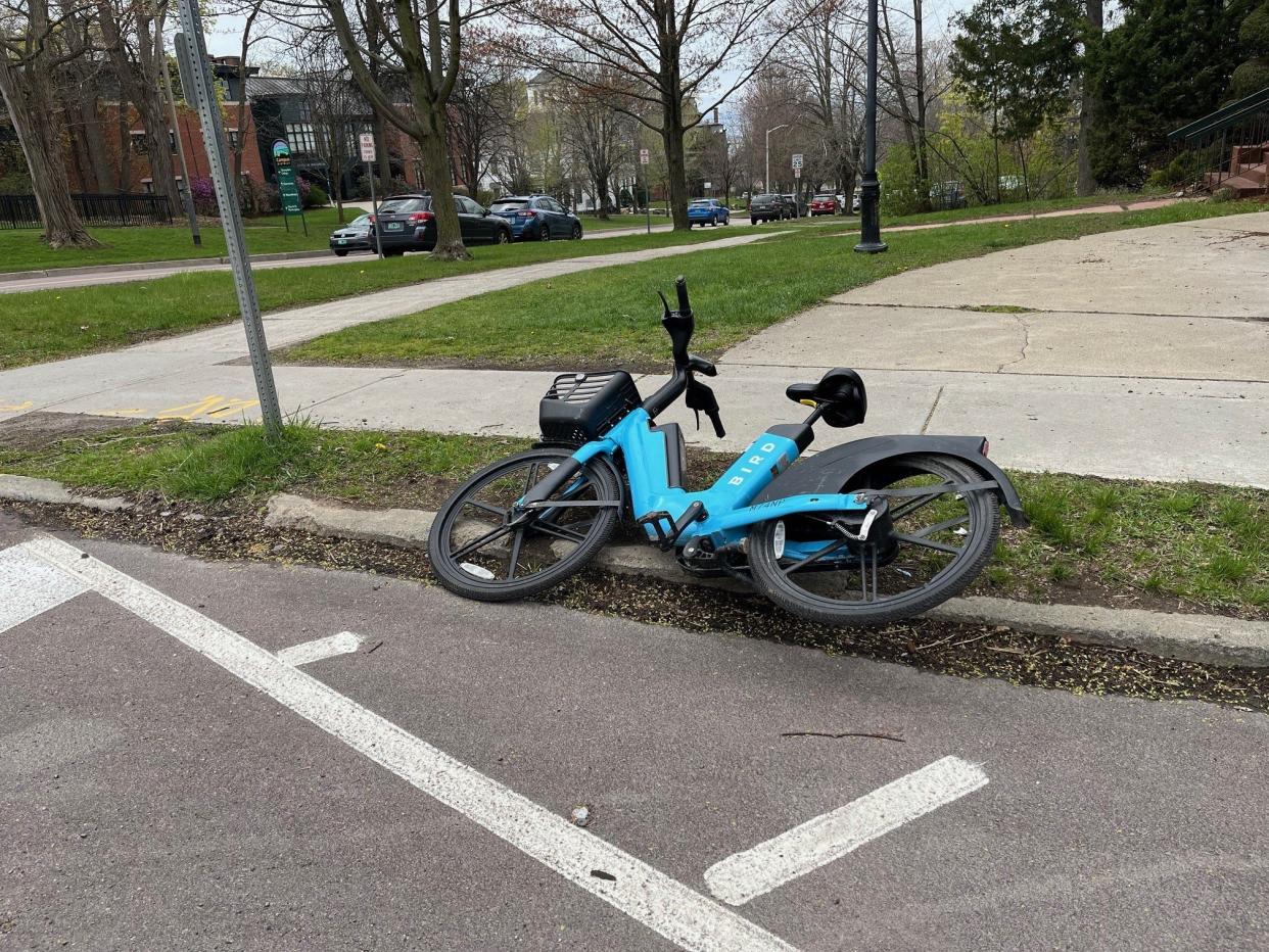 This is not how a Bird should land. The Bird app will tell you where to park. In certain zones, you must park and lock the Bird to a bike rack or in a designated parking area. Other zones have other rules, but the Bird must always be upright. As seen on May 1, 2024.