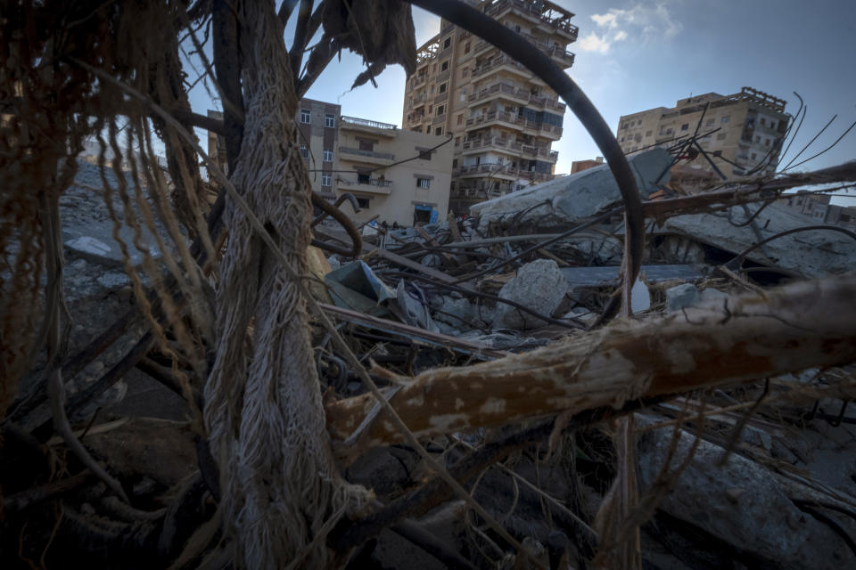 View of the destruction after the floods in Derna, Libya, Friday, Sept. 15, 2023. Search teams are combing streets, wrecked buildings, and even the sea to look for bodies in Derna, where the collapse of two dams unleashed a massive flash flood that killed thousands of people. (AP Photo/Ricardo Garcia Vilanova)