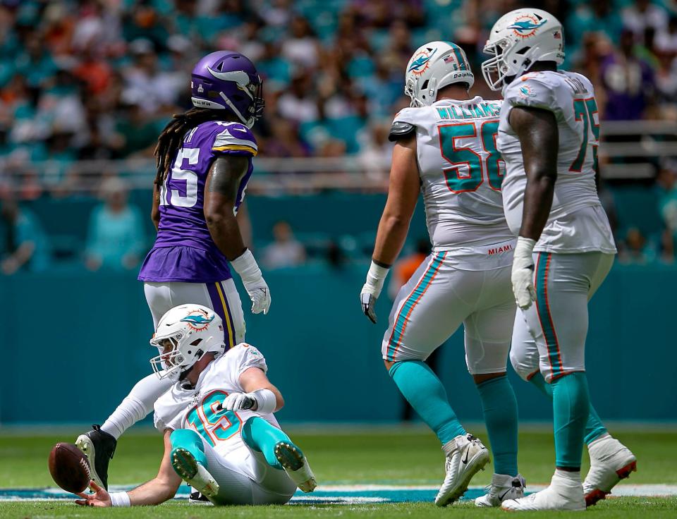 Dolphins quarterback Skylar Thompson is down after being hit by Jordan Hicks in the second quarter. Thompson hit his hand on the helmet of Patrick Jones on the play and did not return to the game.