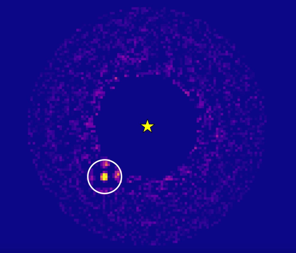  The newfound exoplanet HIP 99770 b (circled), as imaged by Japan's Subaru Telescope. Data from Europe’s star-mapping Gaia spacecraft revealed the likely presence of a big exoplanet in this system. 