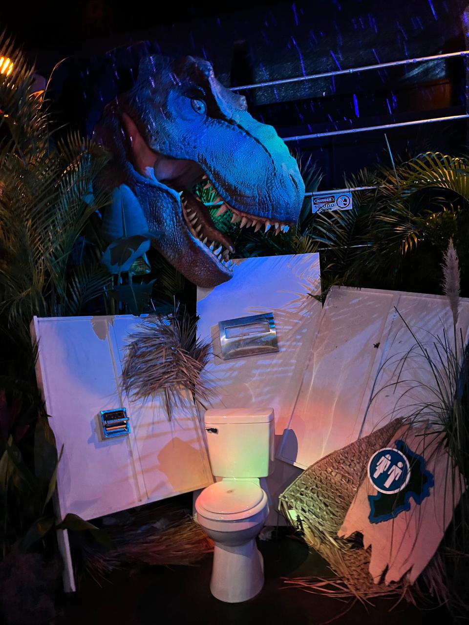 Universal Orlando’s Visual Merchandising and Store Design team members create photo opps when they fit within a story, like this Jurassic Park scene from last summer’s Tribute Store. Other times, the entire store may be treated as one large photo opp.