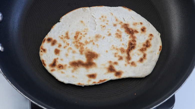 cooked flatbread in pan