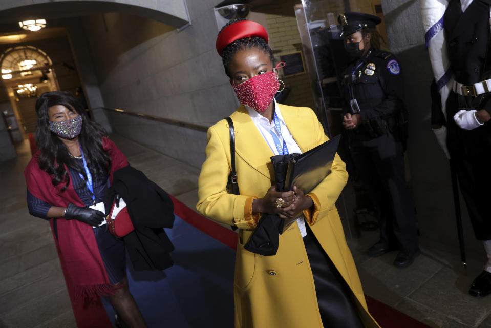 National youth poet laureate Amanda Gorman arrives at the inauguration of U.S. President-elect Joe Biden on the West Front of the U.S. Capitol on Wednesday, Jan. 20, 2021 in Washington. (Win McNamee/Pool Photo via AP)