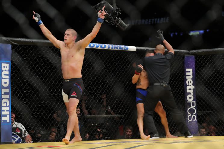 Joe Lauzon celebrates after knocking out Diego Sanchez. (Getty)