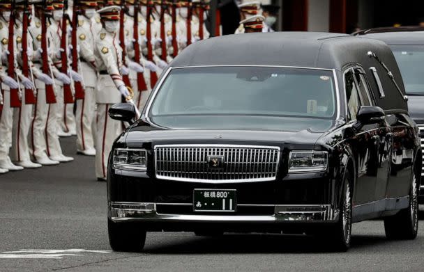 PHOTO: Akie Abe, wife of late former Japanese Prime Minister Shinzo Abe, sits in a vehicle carrying Abe's body, as she leaves after his funeral at Zojoji Temple in Tokyo, Japan, on July 12, 2022. (Issei Kato/Reuters)