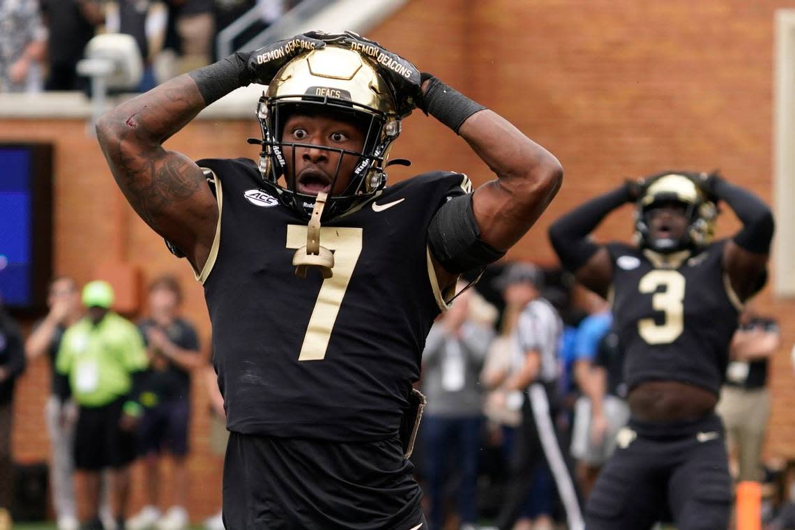 Wake Forest defensive back Gavin Holmes (7) reacts after being called for pass interference against Clemson during the first half of an NCAA college football game in Winston-Salem, N.C., Saturday, Sept. 24, 2022.