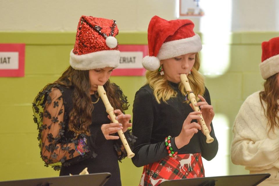 The seven-member recorder band performed holiday music during White Christmas.