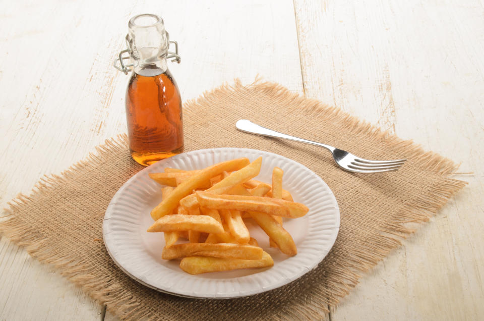 Malt vinegar is the perfect addition to French fries. (Photo: Szakaly via Getty Images)