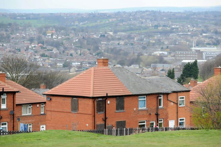 The former home, left, of Shannon Matthews in Dewsbury Moor.