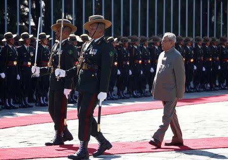 Indian President Pranab Mukherjee inspects a guard of honour upon his arrival at the Tribhuvan International Airport in Kathmandu, Nepal November 2, 2016. REUTERS/Navesh Chitrakar