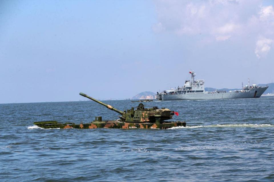 The Chinese military has begun conducting massive military drills encircling Taiwan in "punishment" for the self-governing island's election of a new president this week.