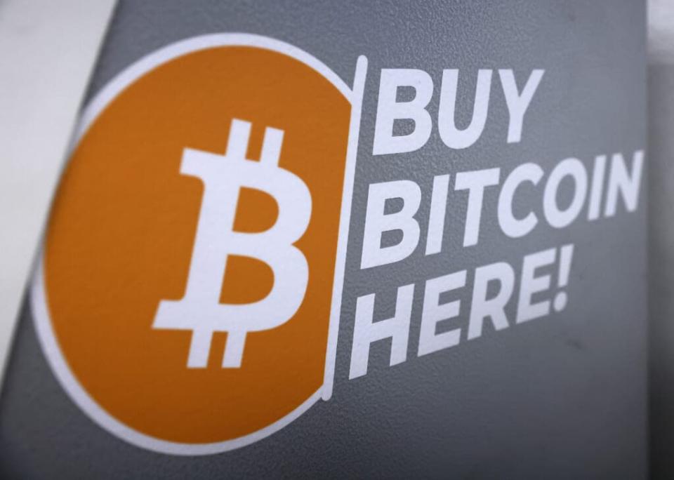 The Bitcoin logo is displayed on the side of a Bitcoin ATM on November 10, 2021 in Los Angeles, California. (Photo by Mario Tama/Getty Images)