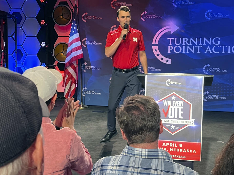 Conservative activist Charlie Kirk takes the stage before a rally held by the Nebraska Republican Party calling on Nebraska to switch to a winner-take-all method of awarding Electoral College votes ahead of this year's hotly contested presidential election, Tuesday, April 9, 2024, in Omaha, Neb. Nebraska has five presidential electoral votes, but allows the votes tied to its three congressional districts to be split based on the popular vote within each district. Maine is the only other state to split its electoral votes. (AP Photo/Margery Beck)