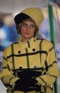 <p>Here, Princess Diana wore an Escada coat with a Phillip Somerville hat in Berlin. I mean, this woman literally ran '80s fashion. Sorry, I don't make the rules ¯\_(ツ)_/¯. </p>