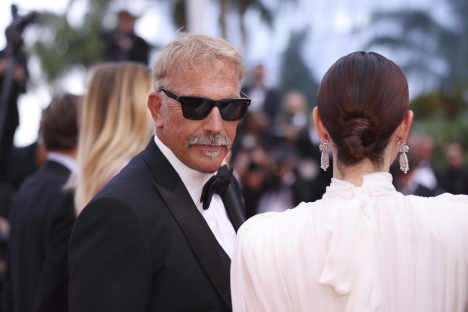 Kevin Costner, left, poses for photographers upon arrival at the premiere of the film 'Horizon: An American Saga' at the 77th international film festival, Cannes, southern France, Sunday, May 19, 2024. (Photo by Vianney Le Caer/Invision/AP)