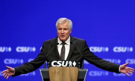 Bavarian Prime Minister and head of the Christian Social Union (CSU) Horst Seehofer gestures during his speech at CSU party congress in Munich, Germany November 5, 2016. REUTERS/Michaela Rehle