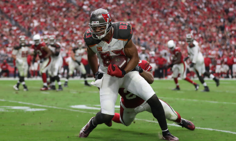 Tampa Bay Buccaneers wode receiver Vincent Jackson is tackled during a game.
