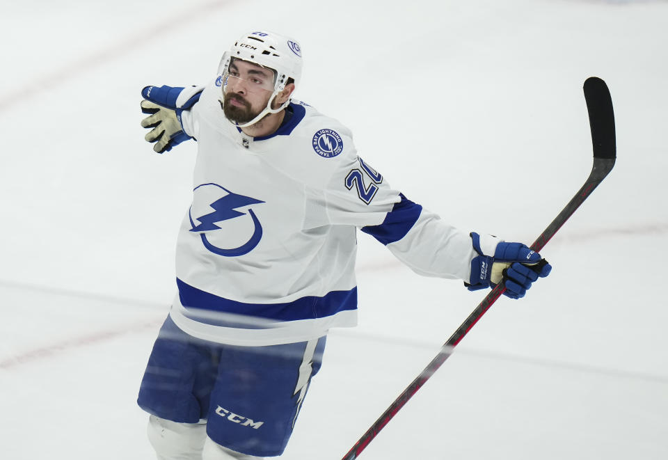 Tampa Bay Lightning forward Nicholas Paul celebrates his second goal of the night against the Toronto Maple Leafs, during the second period in Game 7 of a first-round series in the NHL hockey Stanley Cup playoffs Saturday, May 14, 2022, in Toronto. (Nathan Denette/The Canadian Press via AP)