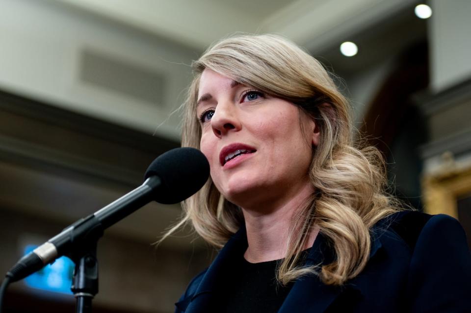 Minister of Foreign Affairs Melanie Joly speaks to reporters in the Foyer of the House of Commons on Parliament Hill in Ottawa, on Monday, March 18, 2024.