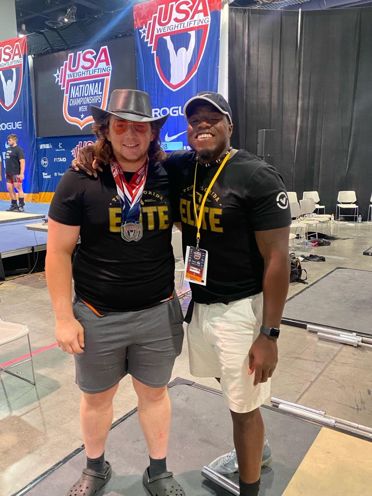 Lake Wales' Devon Briggs', left, and Lake Wales weightlifting head coach Tashawn Williams stand next to each other in celebration after Briggs placed second in the USA National Championships last month.