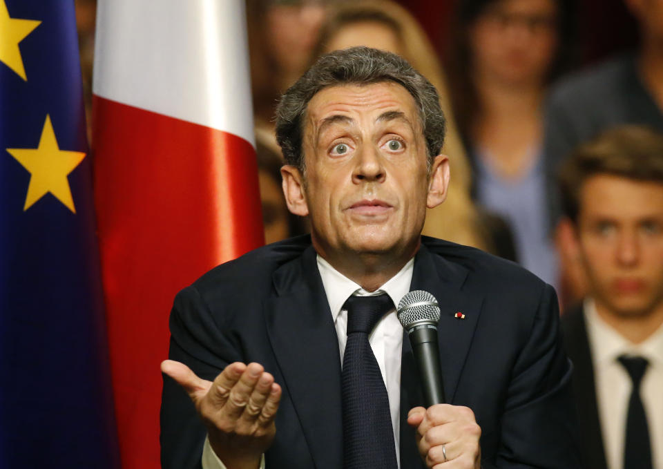 FILE - In this Oct.6, 2014 file photo, former French President Nicolas Sarkozy speaks during a campaign meeting for the leadership of the conservative UMP party in Velizy, west of Paris. The trial of former French President Nicolas Sarkozy concludes Tuesday in Paris, after a month during which the court sought to determine whether he broke laws on campaign financing in his unsuccessful 2012 re-election bid. (AP Photo/Michel Euler, File)