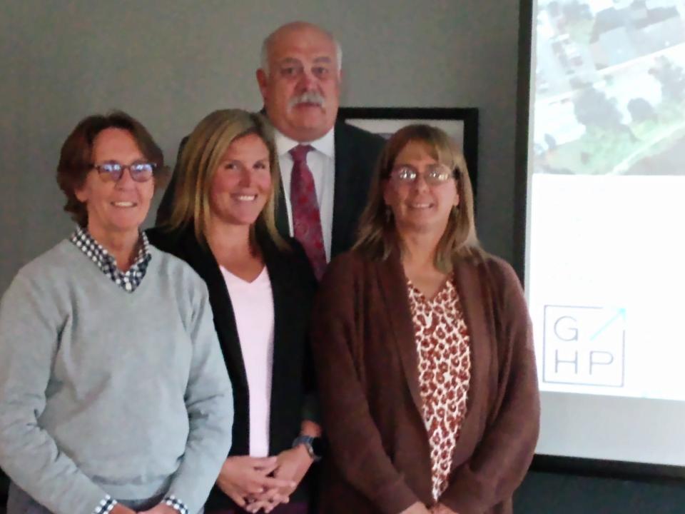 Greater Honesdale Partnership (GHP) held a kickoff presentation about the 12th Street revitalization project at the Honesdale Golf Club on Sept. 20. From left are Patti Bursis, GHP board; Emily Wood, Woodland Designs; Sandi Levens, GHP executive director. In back: Brian Wilken, GHP board.