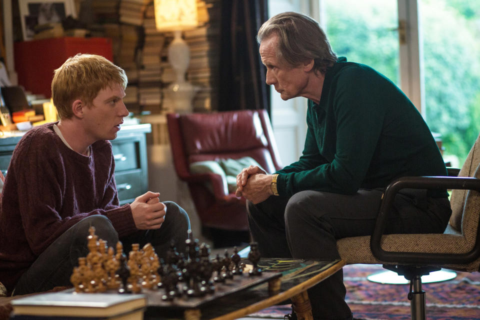 Domhnall Gleeson and Bill Nighy talking.