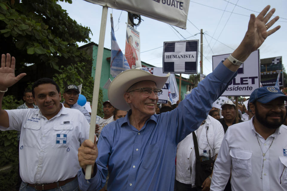 FILE - In this June 12, 2019, file photo, Edmond Mulet, presidential candidate of the Humanist political party, waves to residents as he campaigns prior to June 16 general elections, in La Democracia, Guatemala. (AP Photo/Moises Castillo, File)